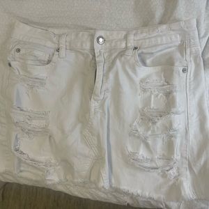 White ripped denim skirt